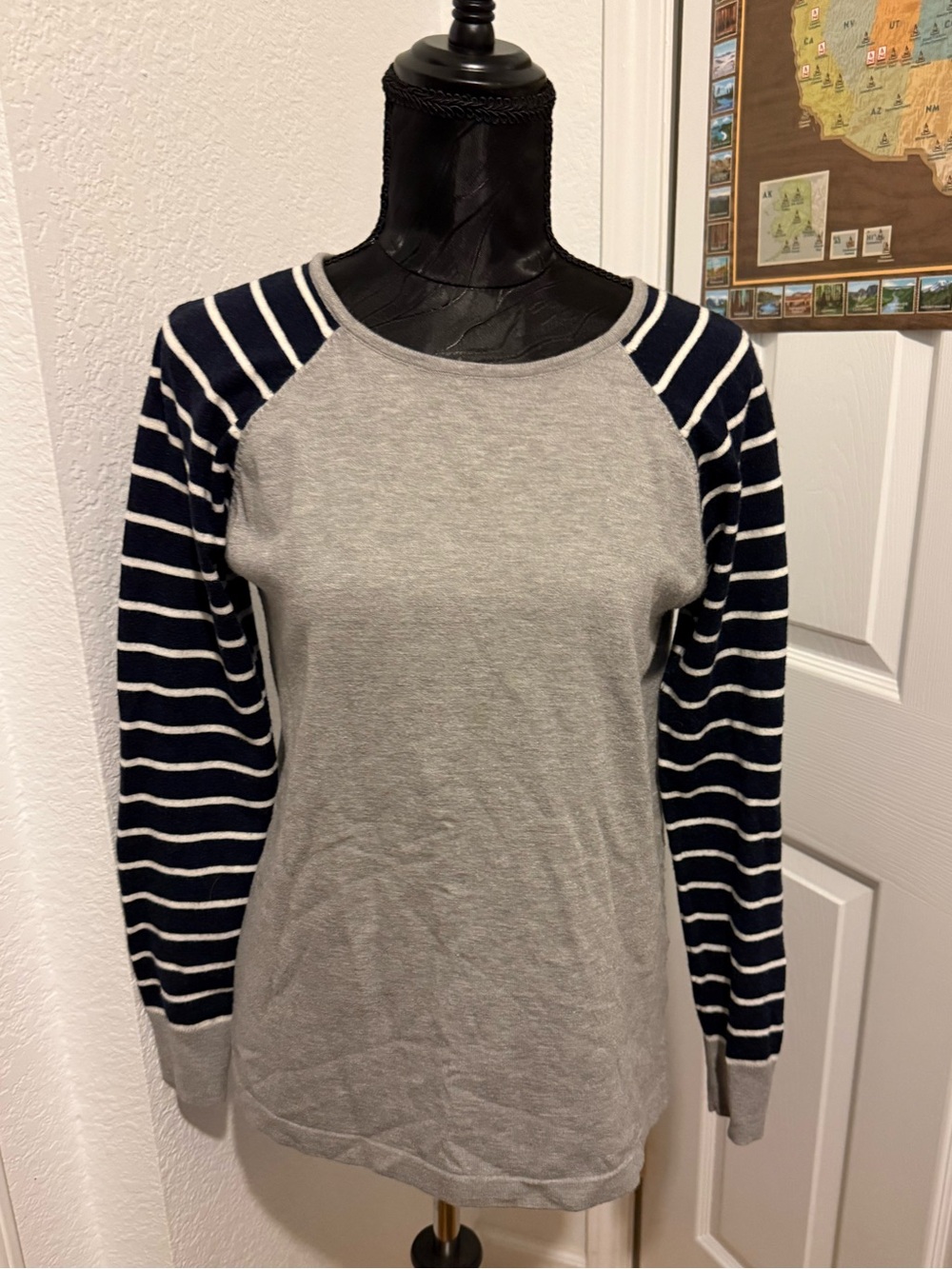 long sleeve striped navy , gray , and white shirt with brown elbows